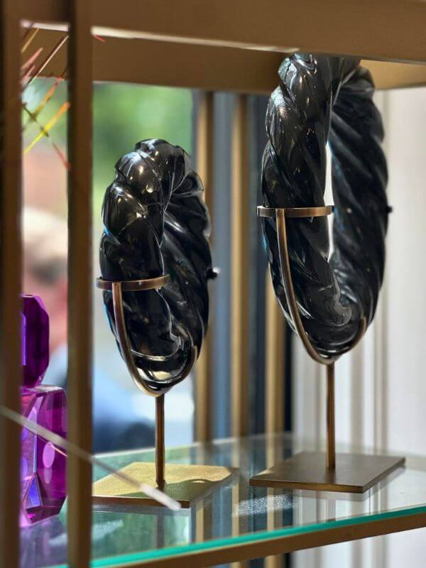 Luxury black marble twisted disk sculpture for modern interiors