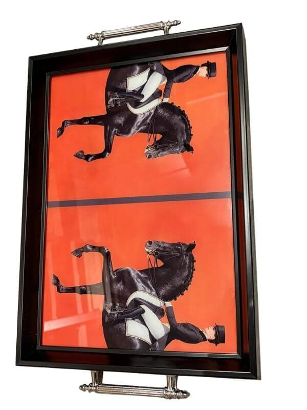 Artistic horse design glass serving tray featuring a vibrant orange background and equestrian motif.