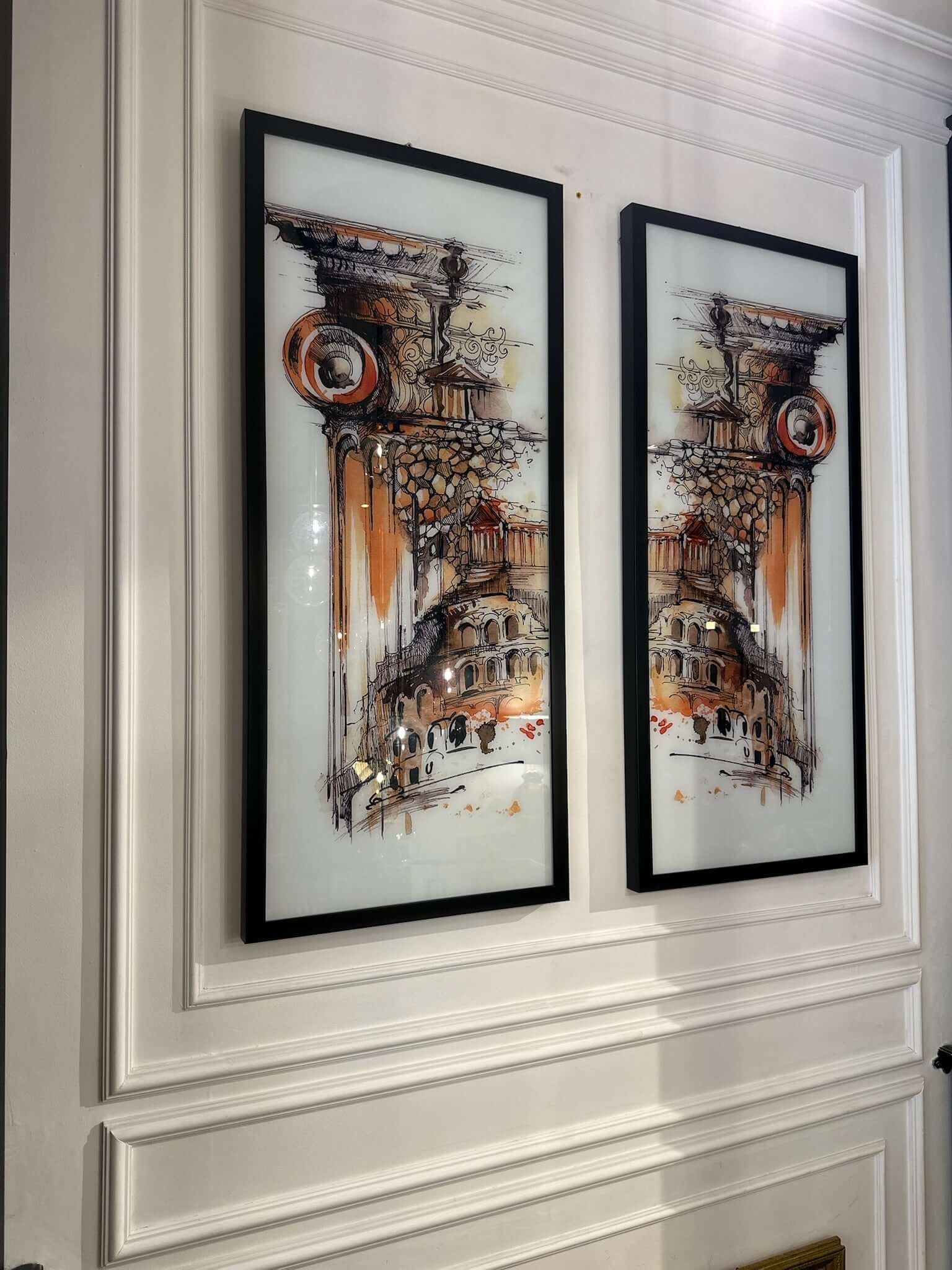 Framed glass wall art black metal frame featuring classical columns and ruins in a modern design.
