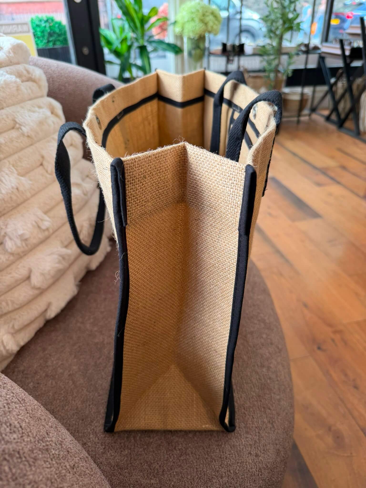 Deco Moore Jute Tote Bag showing the interior structure, woven handles, and black trims for stylish everyday use.